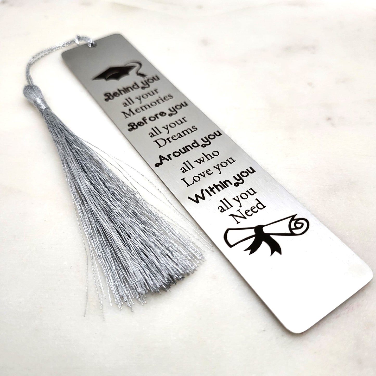 Inspirational Bookmark with Quote Behind you all your memories, Before you all your Dreams.