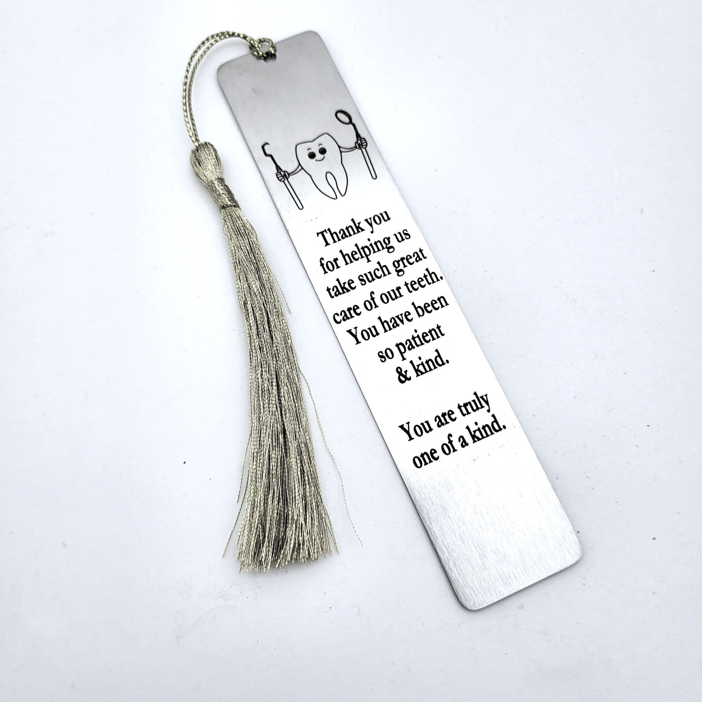 Dentist Bookmark Gift - Thank you for helping us take such great care of our teeth. You have been so patient and kind. You are truly one of a kind bookmark.