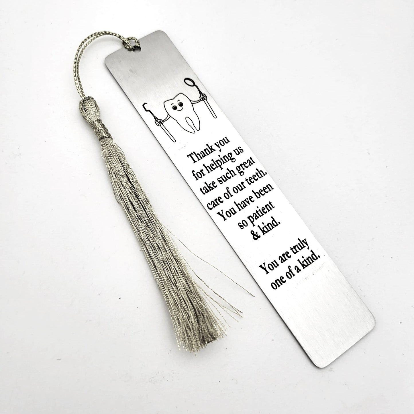 Dentist Bookmark Gift - Thank you for helping us take such great care of our teeth. You have been so patient and kind. You are truly one of a kind bookmark.